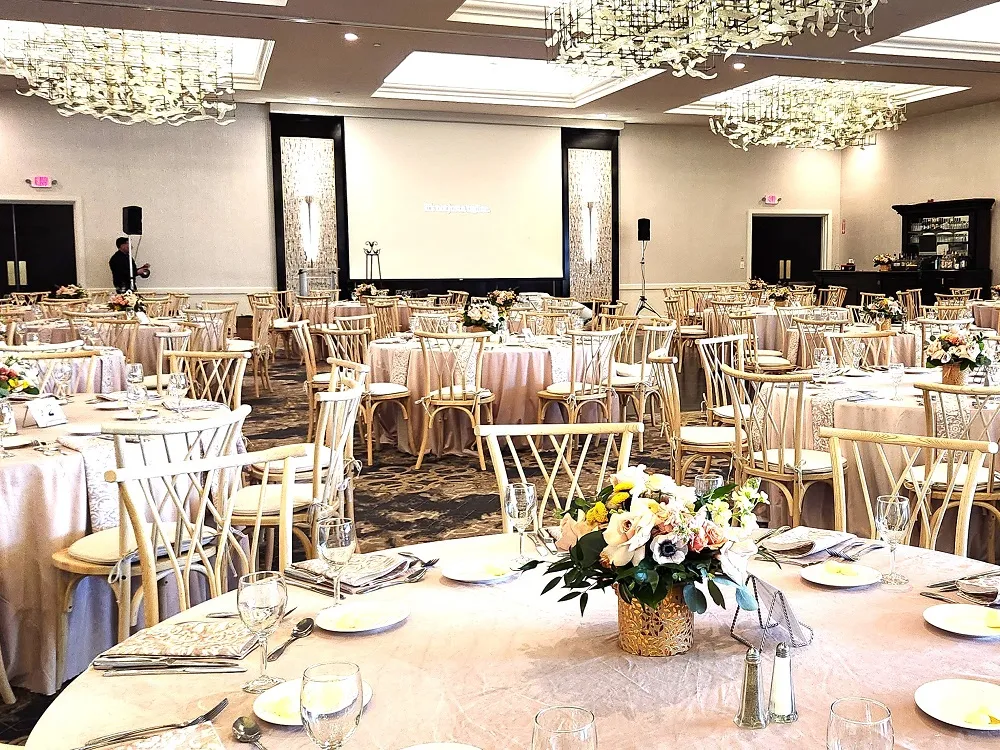 Beautiful corporate event room setup at Kirkbrae with projector screen in background