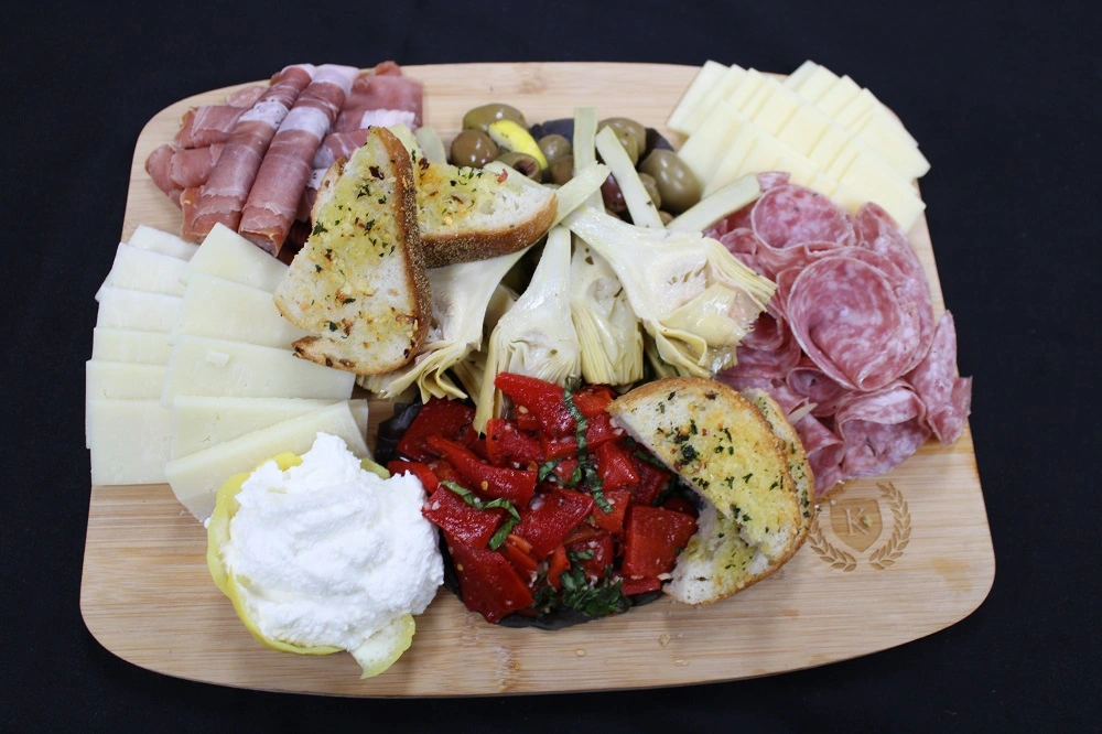 Charcuterie board with salted meats and cheeses