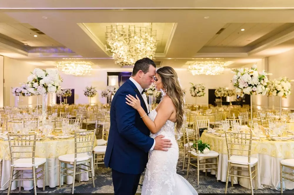 Bride and groom kissing after their first dance in our newly renovated banquet hall