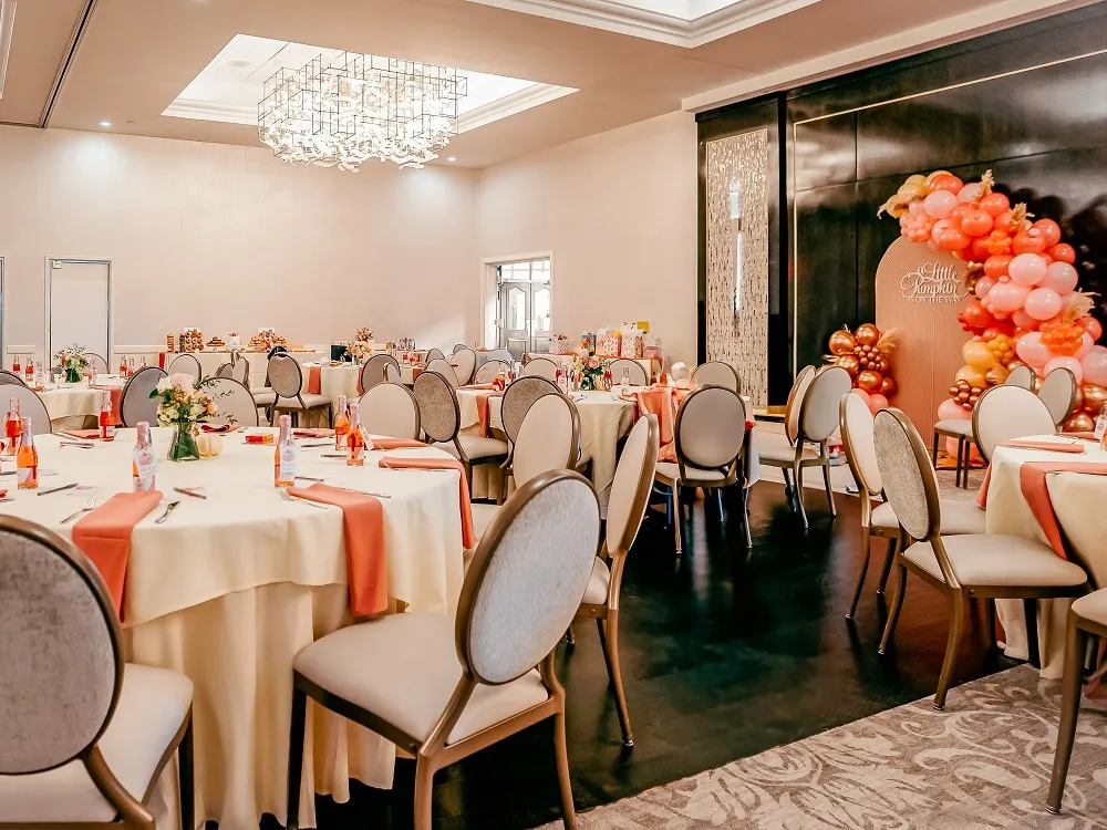 Colorfully decorated baby shower with pink and white balloons in the North Ballroom at Kirkbrae CC