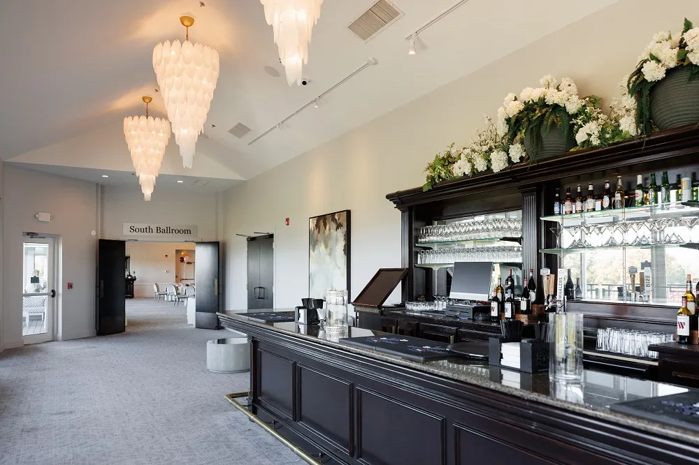 View from South Ballroom balcony area looking down the bar into the open doors of the decorated South Ballroom