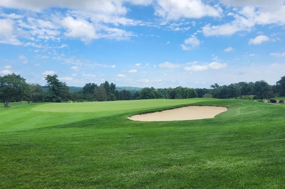 Photo of green and bunker on the golf course at Kirkbrae Country Club