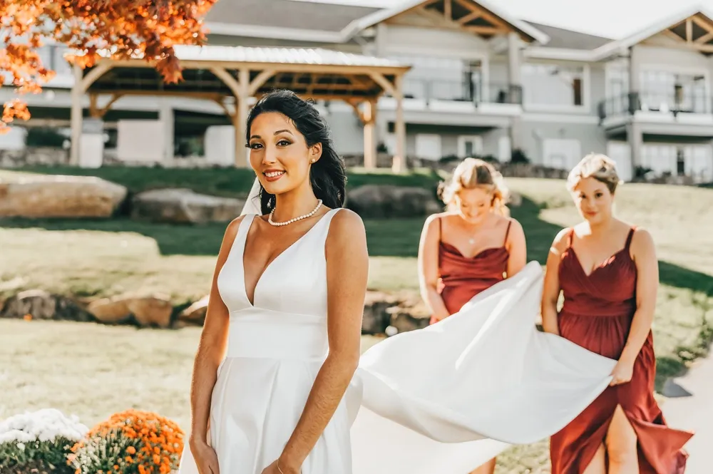 Beautiful bride getting her veil held in front of Kirkbrae Country Club