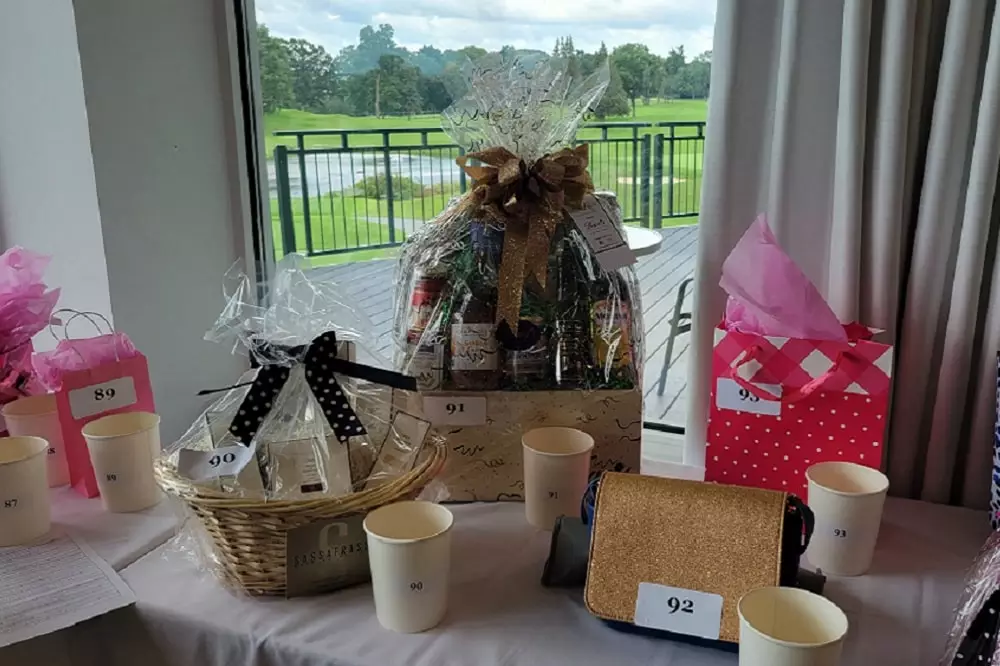 Gift baskets on a table for an auction event